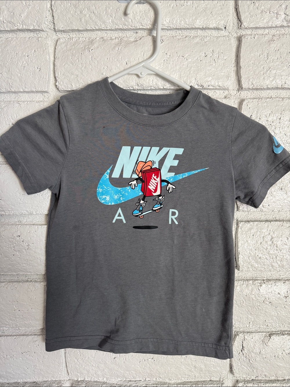 Nike Gray Kids' Short-Sleeve Tee with Blue Swoosh and Red Cartoon